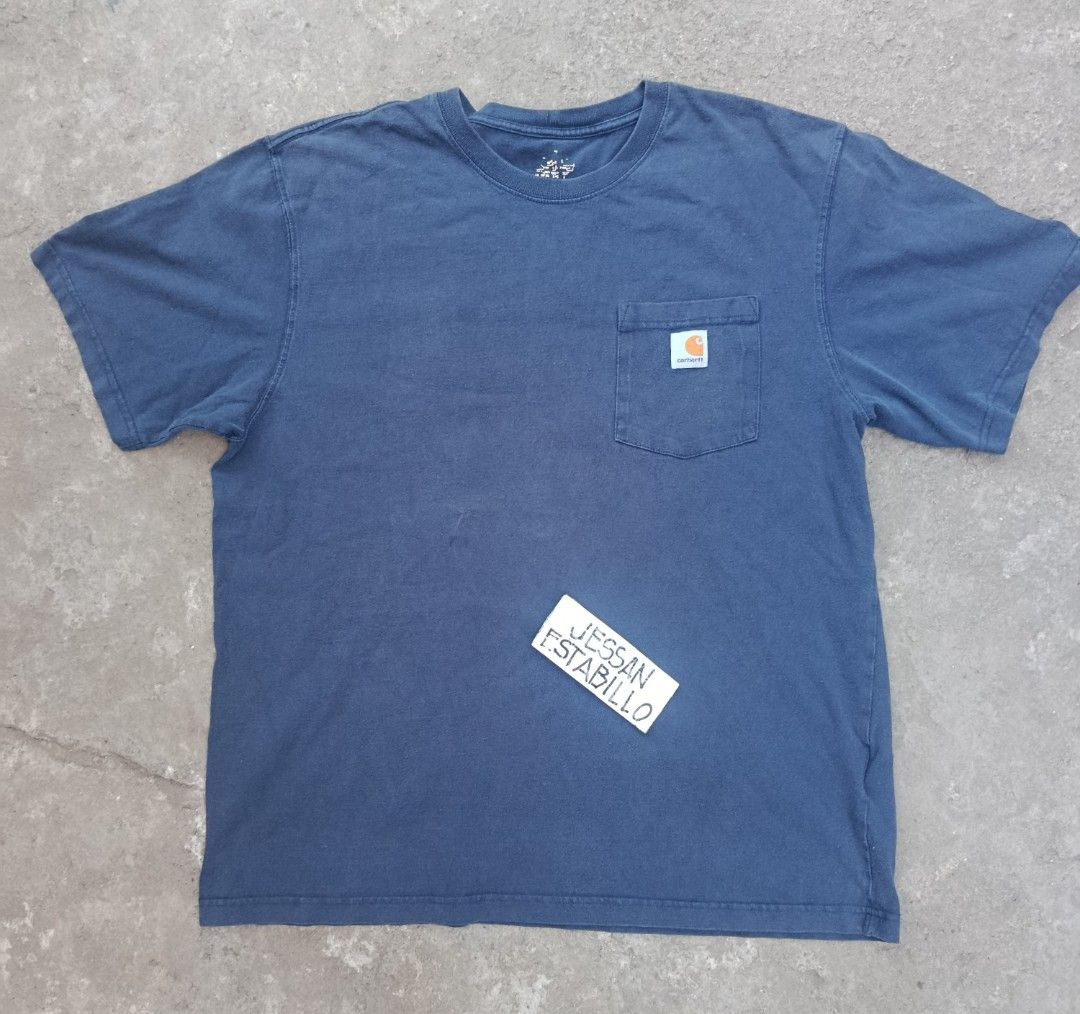 Carhartt Pocket Tee - Navy Blue - Large (Category: Tshirts & Polo Shirts ) located in Concepcion. Submitted by lowkeythrifter.ph (Listing ID 1439688669, Image 2). Description: Carhartt K87 NVY Actual: W23.5 x L29.5 On tag: L Good Condition Nice Fades See pics for actual measurements & issues. 7️⃣9️⃣9️⃣ Shipped Gcash / Palawan, Payment First. Bawal sa Maselan, PM if Interested. 1st to Pay God bless....