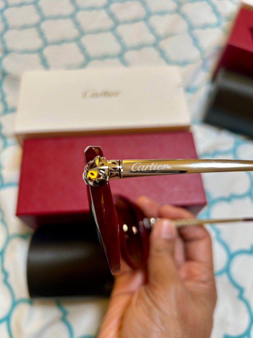 Cartier sunglasses burgundy Preloved (Category: Sunglasses & Eyewear) located in Taguig. Submitted by ramsthrift (Listing ID 1439694049, Image 2). Description: Cartier sunglasses Burgundy preloved * guaranteed authentic * condition 9/10 * complete with case and box.