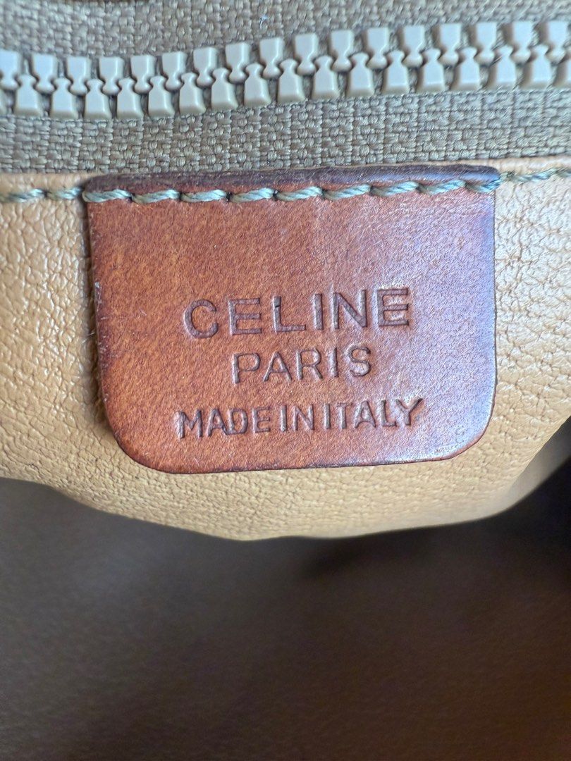 CELINE MACADAM VINTAGE CLUTCH BAG (Category: Luxury Bags & Wallets) located in Paranaque City. Submitted by lyn0618 (Listing ID 1439738935, Image 3). Description: FOR SALE! AUTHENTIC. CELINE VINTAGE. MACADAM. LEATHER CLUTCH BAG PRE LOVED ITEM. ISSUE: SOME LEATHER TRIMMINGS BROWN LIGHTEN .DUE TO ITS. USAGE. Still USABLE . GOOD CORNERS AND SIDES AND BASE SEE PHOTO. NO. OPEN PIPES. NO TRANSFER. ORIGINAL CELINE ZIPPER PULLER SEE PHOTOS LEATHER. STRAP