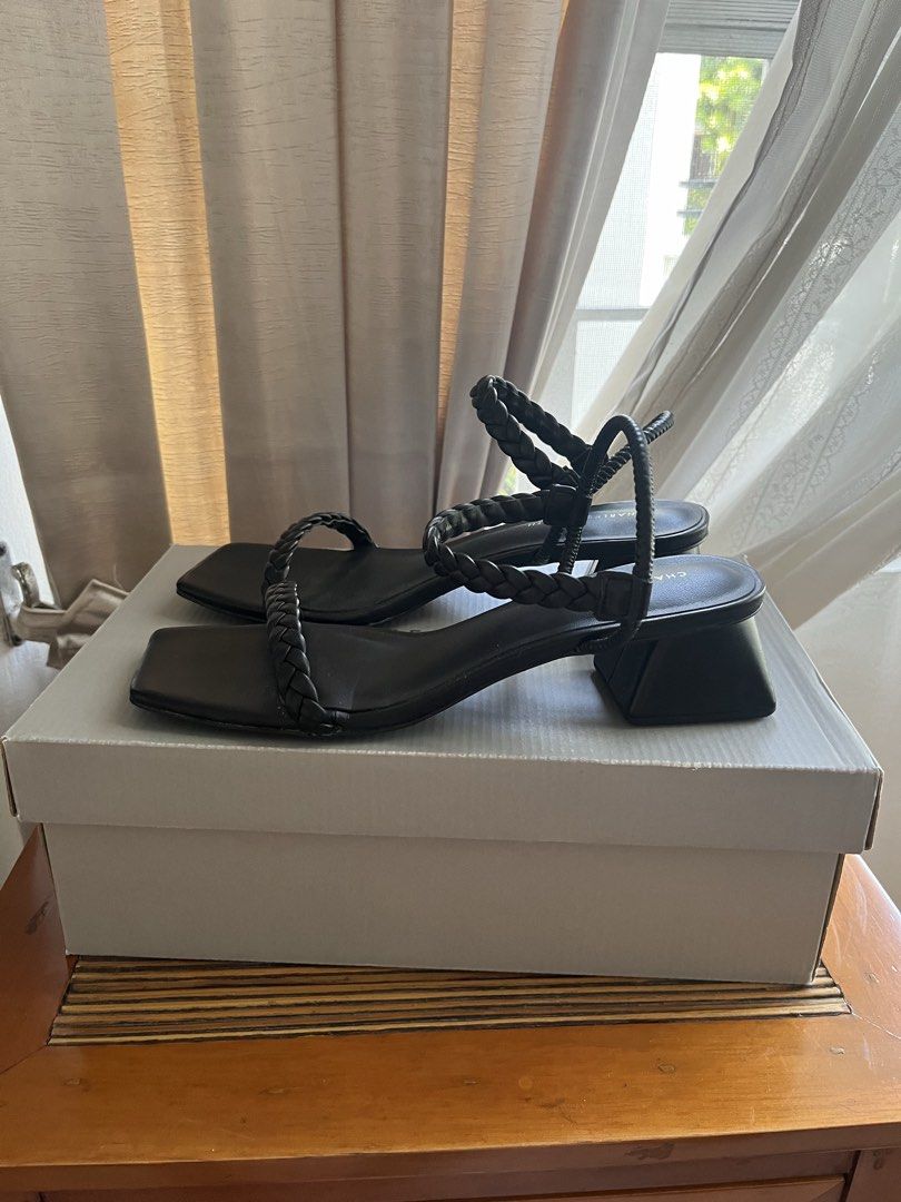 Charles & Keith Braided Strap Sandals - Black (Category: Flats & Sandals) located in Las Pinas. Submitted by kva13 (Listing ID 1439634236, Image 2). Description: - Charles & Keith sandals - Black color - Braided straps - Square toe design - Small block heel - Size 36 - Comes with original box.