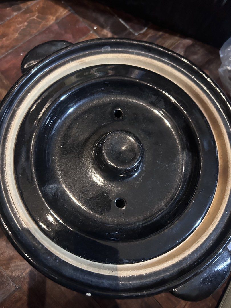 Claypot cookware japanware (Category: Other Kitchenware & Tableware) located in Manila. Submitted by drummergirl012 (Listing ID 1439762039, Image 3). Description: Black claypot Has a few chips on top Selling as is With free big claypot (random design) Location: paranaque.