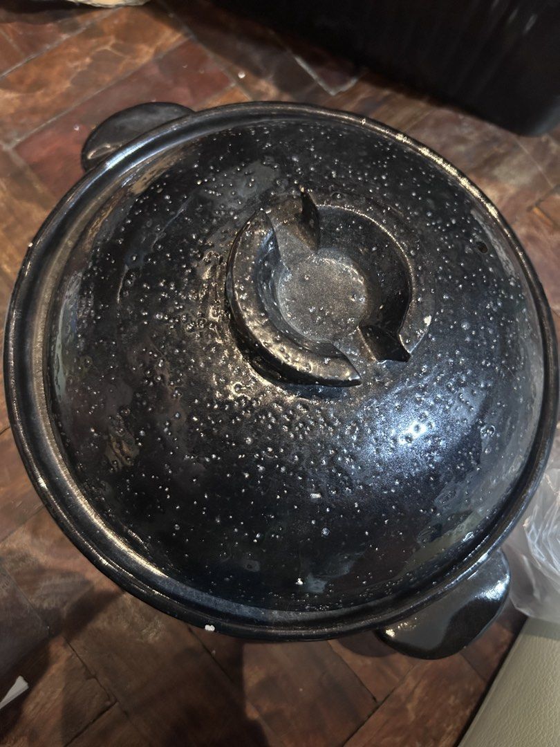 Claypot cookware japanware (Category: Other Kitchenware & Tableware) located in Manila. Submitted by drummergirl012 (Listing ID 1439762039, Image 2). Description: Black claypot Has a few chips on top Selling as is With free big claypot (random design) Location: paranaque.