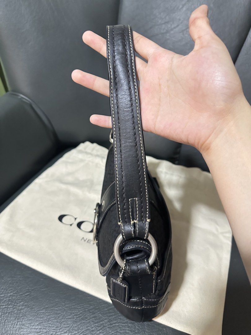 Coach Triple Black Mini Soho (Category: Luxury Bags & Wallets) located in Paranaque City. Submitted by gwyvault (Listing ID 1439631650, Image 3). Description: COACH Soho Signature Flap 🐾 100% authentic and vintage piece 🐾 Serial No. F0749-F10925 🐾 Triple Black in size mini 🐾 Rank A — no rubs on canvas and clean interior Remarks: still like new condition. with minimal hairlines on one side of strap only (not stripping—still intact!!) maintaine