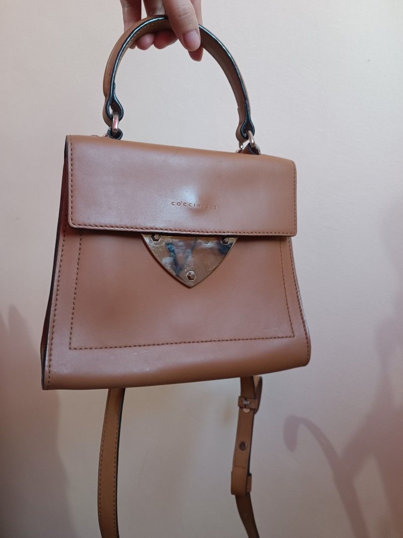 RUSH SALE Coccinelle bag (Category: Cross-body Bags) located in Paranaque City. Submitted by earlylux (Listing ID 1439656412, Image 1). Description: Please inspect photos for signs of usage/flaw No inclusions! Normal signs of usage please manage your expectations you're buying a secondhand bag. Pm for more details No return, no refund, no exchange, no cancellation! First to pay Joy miners will be blocked! MOP: Payment first gcash MOD: J&T and Lal