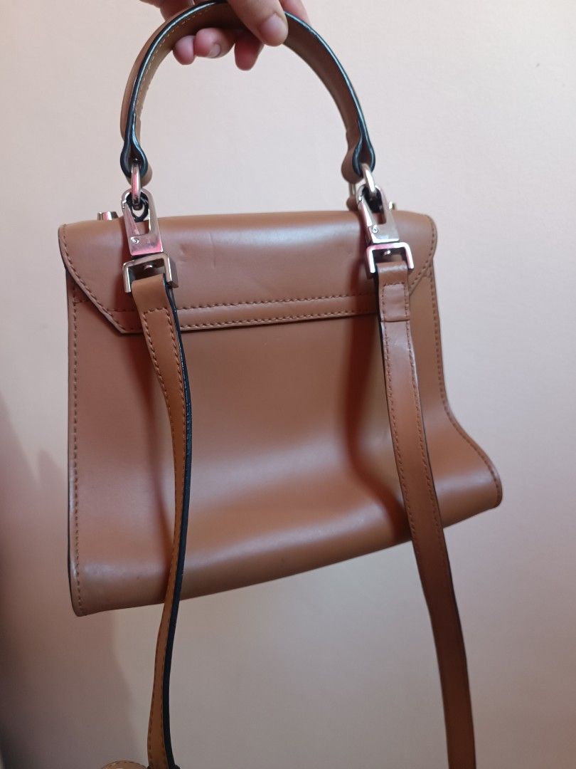 RUSH SALE Coccinelle bag (Category: Cross-body Bags) located in Paranaque City. Submitted by earlylux (Listing ID 1439656412, Image 2). Description: Please inspect photos for signs of usage/flaw No inclusions! Normal signs of usage please manage your expectations you're buying a secondhand bag. Pm for more details No return, no refund, no exchange, no cancellation! First to pay Joy miners will be blocked! MOP: Payment first gcash MOD: J&T and Lal