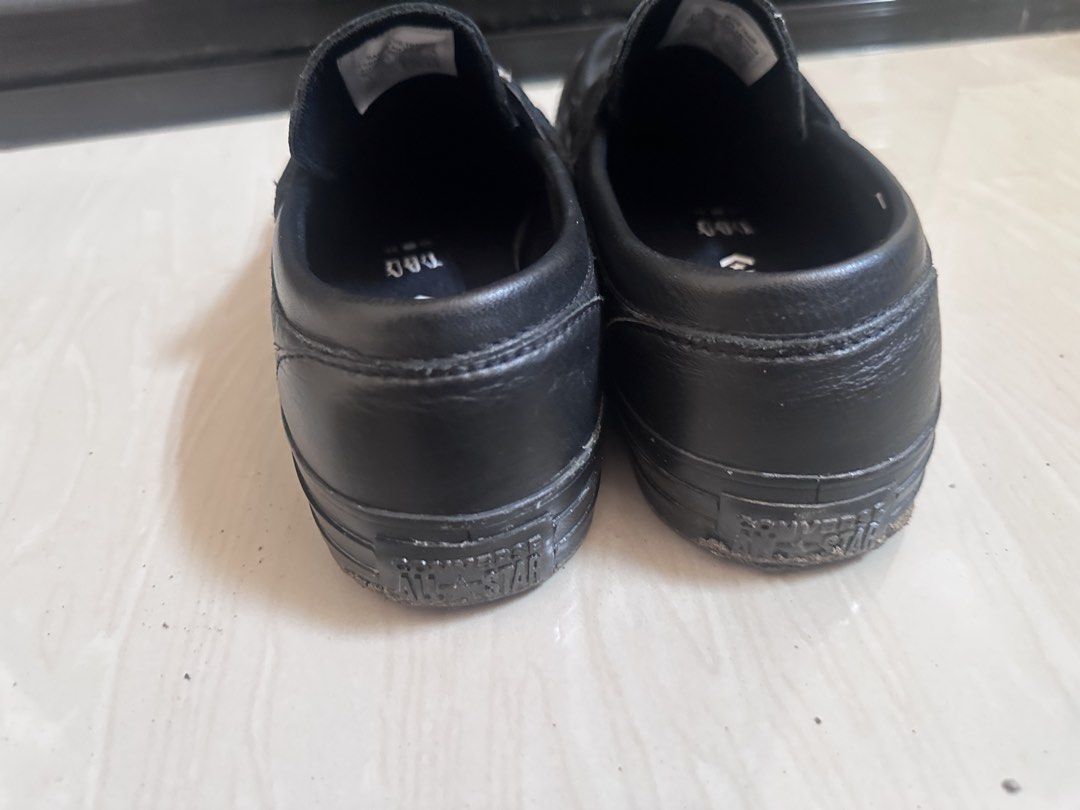 Converse CTAS Loafer Men's Sneakers - Black (Category: Sneakers) located in Quezon City. Submitted by nedz93 (Listing ID 1439660897, Image 2). Description: Converse CTAS Loafer men's sneakers in black. Features a slip-on design with a leather upper and a star logo detail. The insole has the Converse logo. The soles show some wear..
