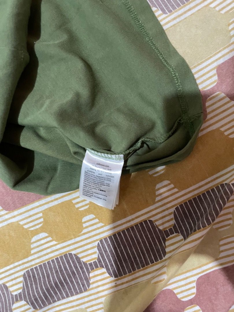 Cotton On Green Top XS (Category: Shirts) located in Pasig City. Submitted by sunibebe (Listing ID 1439660297, Image 2). Description: COTTON ON Green Top 💚✨ • Original Cotton On • Soft stretchy material • Super flattering fit • Cute ruched detail with mini flower accent • Still has wash tag • Comfy and easy to style • Still in good condition Note: Needs light ironing/steaming only due to storage 😊 📍No return, no exchange 📍Color may vary sligh