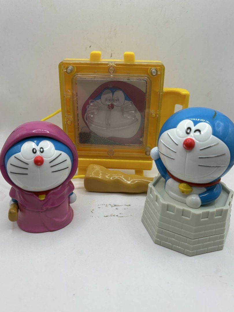 Doraemon Happy Meal Toy Bundle (Category: Character Goods) located in Binan City. Submitted by treasurejoycollection (Listing ID 1439779781, Image 3). Description: Price Image 1-2 Php 135 Image 3 Php 100 Image 4-5 Php 80.