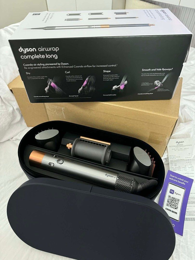 Dyson Airwrap Complete Long (Category: Hair) located in Cainta. Submitted by miko_ri_onlyofferifsure (Listing ID 1439741291, Image 1). Description: - Dyson Airwrap Complete Long for various hair styling options. - Includes attachments for curling, shaping, and smoothing. - Comes with all original components. - Includes storage case and original box. - Complete set ready to use. - NO ISSUE AND NO SCRATCHES DM FOR MORE INFO.