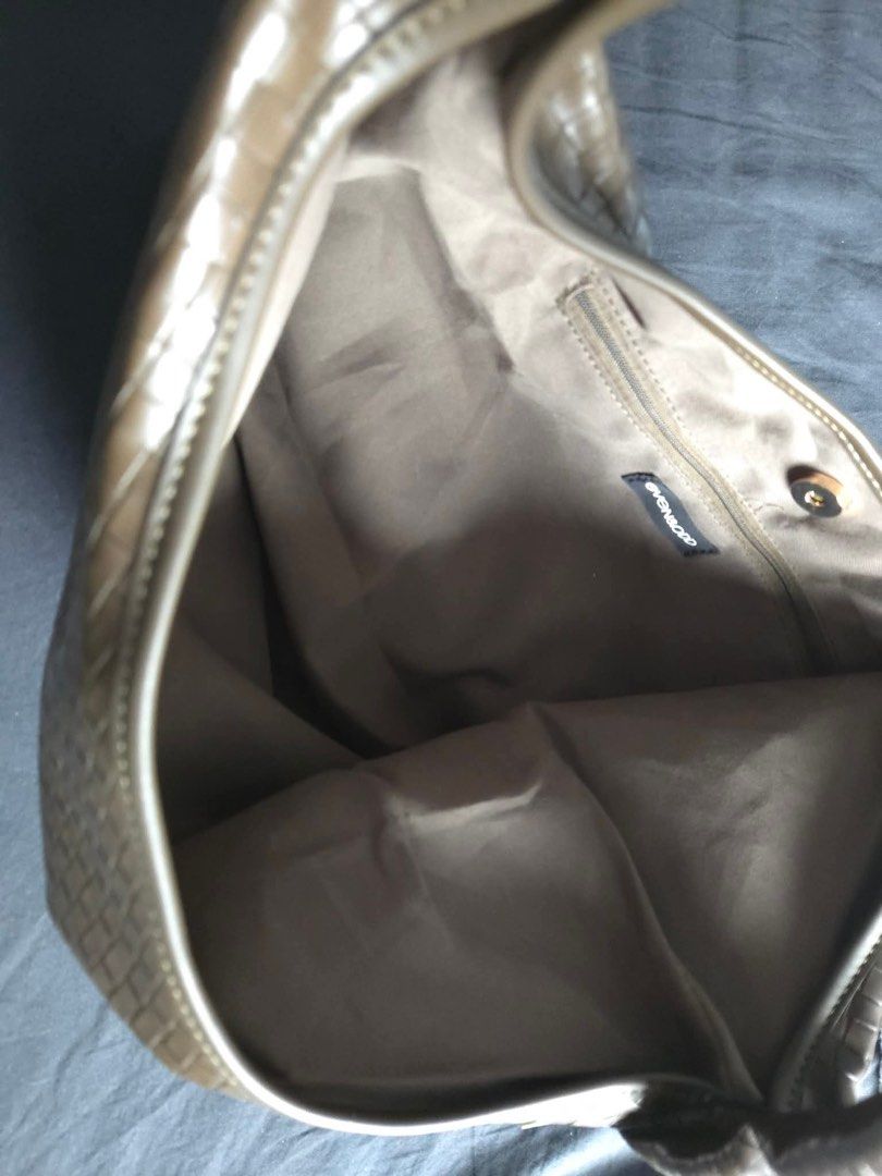 Even & Odd Woven Shoulder Bag (Category: Shoulder Bags) located in Manila. Submitted by corryyy (Listing ID 1439632271, Image 3). Description: - Eve & Odd shoulder bag - bought from Finland - lightweight - Woven design - Knotted handle - Made from recycled polyester - Spacious interior with small pocket - Versatile for everyday use.