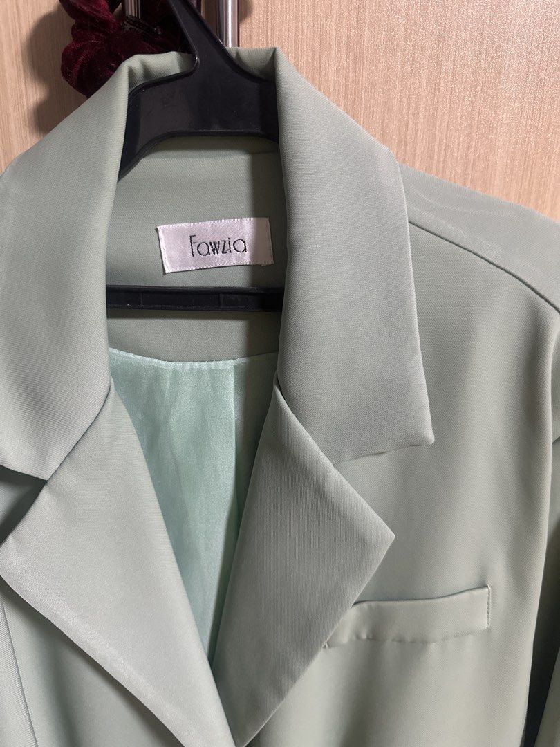 Fawzia Oversized Blazer in Mint Green (Category: Coats, Jackets and Outerwear) located in Manila. Submitted by preowned.anj (Listing ID 1439724665, Image 1). Description: Mint green Fawzia blazer. Double-breasted with front pockets and notched lapel. Light green lining. Classic, tailored style..