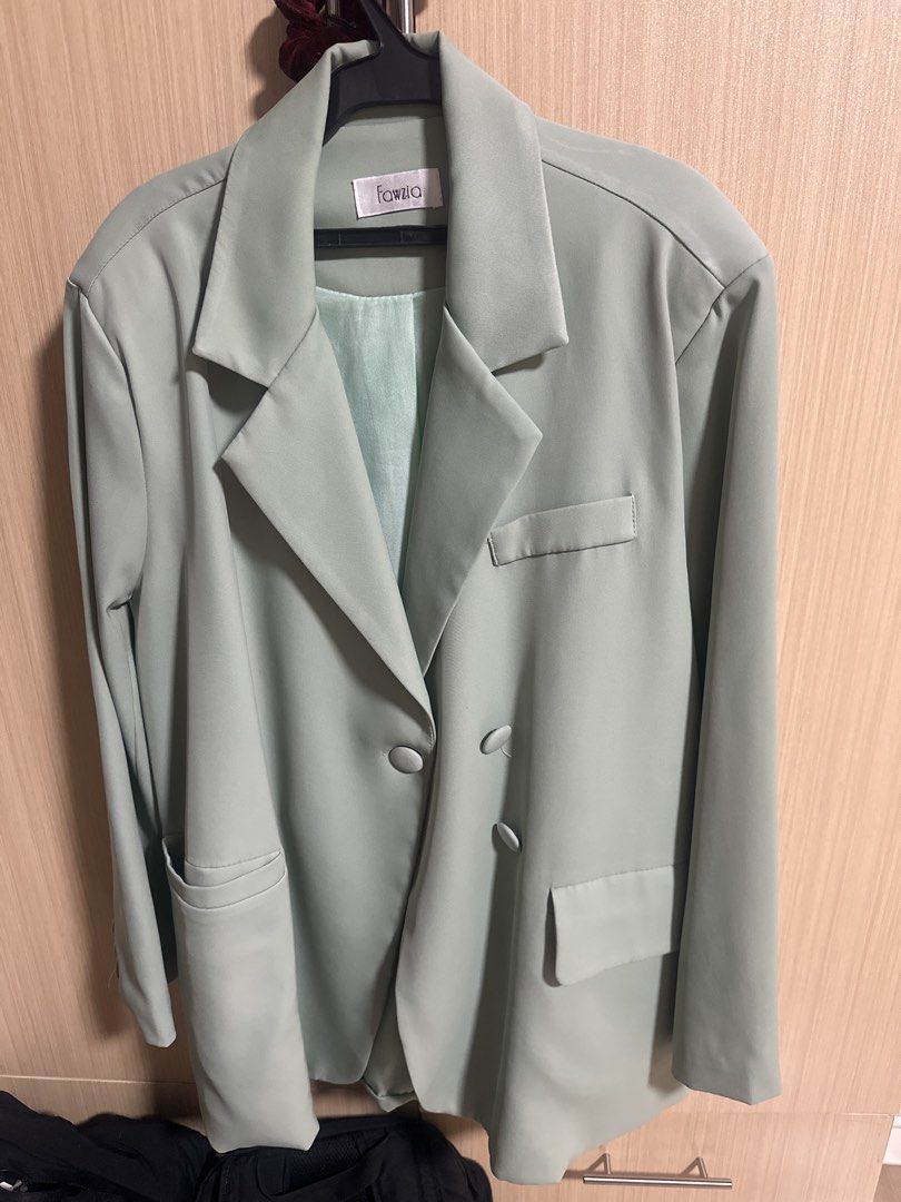 Fawzia Oversized Blazer in Mint Green (Category: Coats, Jackets and Outerwear) located in Manila. Submitted by preowned.anj (Listing ID 1439724665, Image 3). Description: Mint green Fawzia blazer. Double-breasted with front pockets and notched lapel. Light green lining. Classic, tailored style..