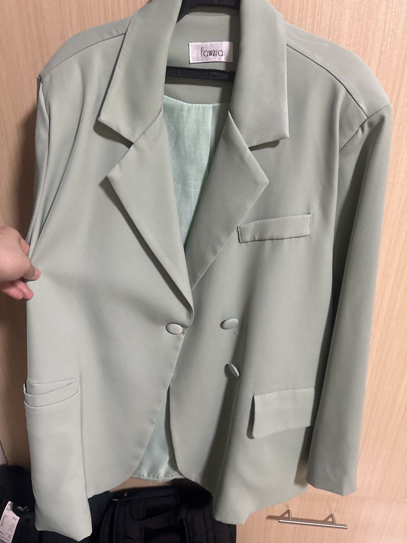 Fawzia Oversized Blazer in Mint Green (Category: Coats, Jackets and Outerwear) located in Manila. Submitted by preowned.anj (Listing ID 1439724665, Image 2). Description: Mint green Fawzia blazer. Double-breasted with front pockets and notched lapel. Light green lining. Classic, tailored style..