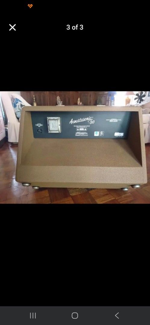 Fender Acoustasonic 30 Guitar Amplifier (Category: Musical Instruments) located in Manila. Submitted by robynmjose (Listing ID 1439782390, Image 3). Description: - Fender Acoustasonic 30 guitar amplifier - Brown cabinet with speaker grill - Fender logo - Multiple control knobs - Various input and output jacks - Rectangular shape with slightly angled top.