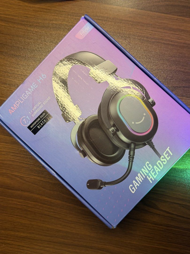 Finne AmpliGame H6 Gaming Headset (Category: Headphones & Headsets) located in Bacolod City. Submitted by BWMCAROUSEL (Listing ID 1439775789, Image 1). Description: - Finne AmpliGame H6 Gaming Headset - 7.1 Virtual Surround Sound - Built-in Microphone - Colorful LED Lights - Includes: Headset, Carrying Pouch, Accessories - Color: Black.