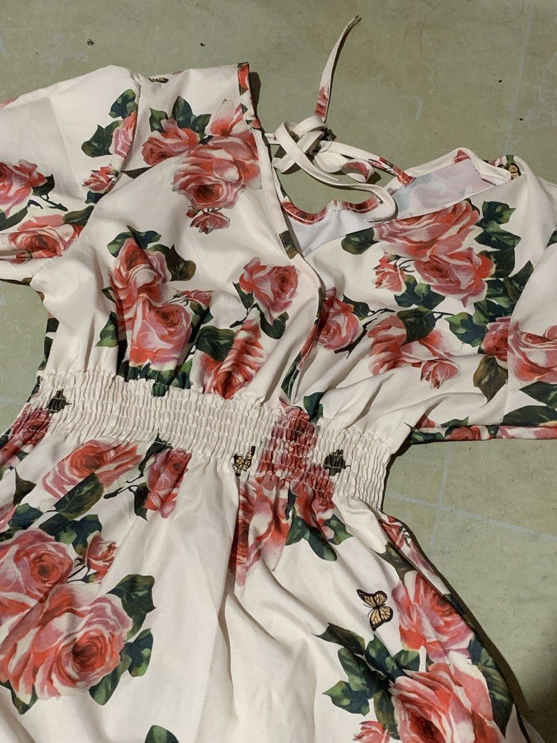 Floral Print Dress (Category: Dresses) located in Manila. Submitted by sammmyyy_oon (Listing ID 1439687878, Image 1). Description: - Floral print with rose design - V-neckline - Short sleeves - Elastic waist - Flowing skirt - Tie-back detail - Suitable for casual and special occasions.