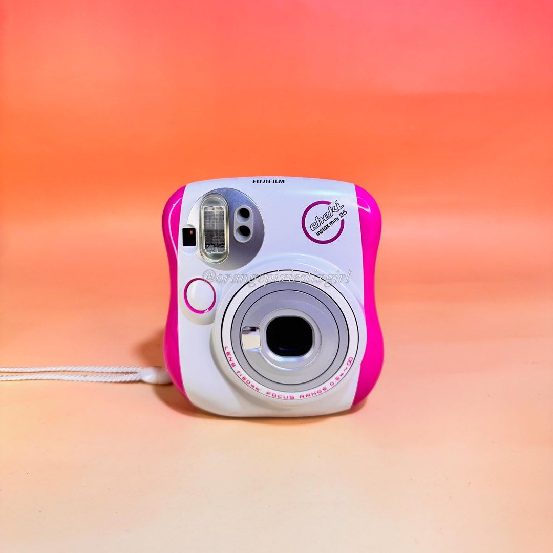 Fujifilm Instax Mini 25 Instant Camera (Pink) (Category: Cameras) located in Bulacan. Submitted by orangepixiestixgirl (Listing ID 1439750049, Image 1). Description: ‼️message me on ig, @orangepixiestixgirl for inquiries and transactions‼️ ‼️CAN’T REPLY HERE‼️ Fujifilm Instax Mini 25 Instant Camera (Pink) —This camera has an automatic electronic flash and a programmed electronic shutter. —Flash and Zoom working. —Uses two CR2 battery —Uses Fujifi