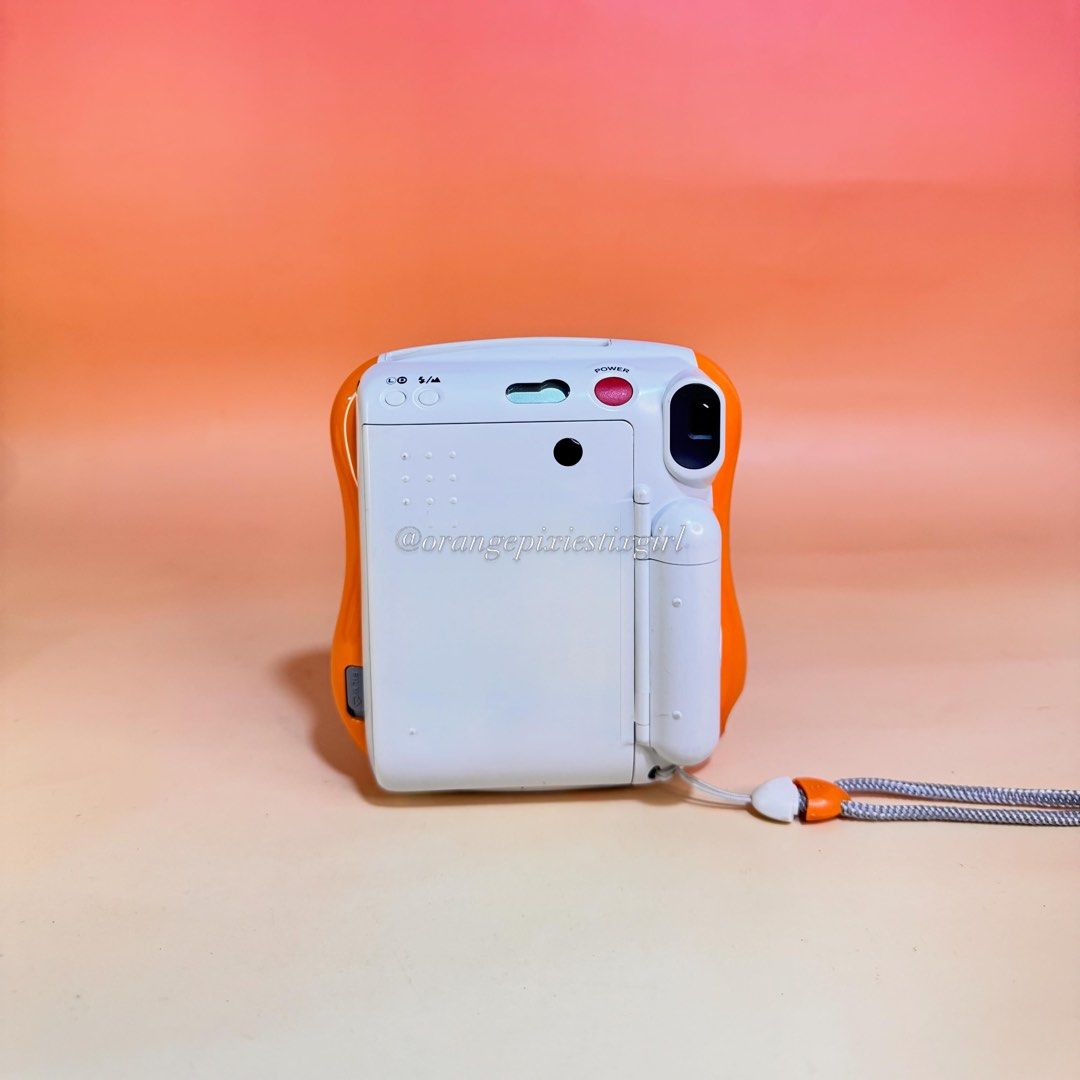Fujifilm Instax Mini 25 Instant Camera (Orange) (Category: Cameras) located in Bulacan. Submitted by orangepixiestixgirl (Listing ID 1439750422, Image 2). Description: ‼️message me on ig, @orangepixiestixgirl for inquiries and transactions‼️ ‼️CAN’T REPLY HERE‼️ Fujifilm Instax Mini 25 Instant Camera (Orange) —This camera has an automatic electronic flash and a programmed electronic shutter. —Flash and Zoom working. —Uses two CR2 battery —Uses Fu