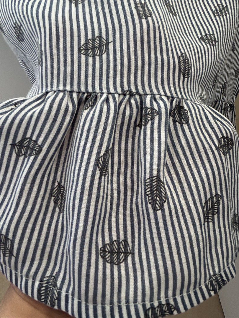Glamour Striped Leaf Print Top (Category: Blouses) located in Manila. Submitted by jaynojayno (Listing ID 1439618446, Image 3). Description: - Striped pattern with leaf prints - Short sleeves - Ruffled hem - Round neckline - Lightweight fabric - Suitable for casual wear - Simple and stylish design.