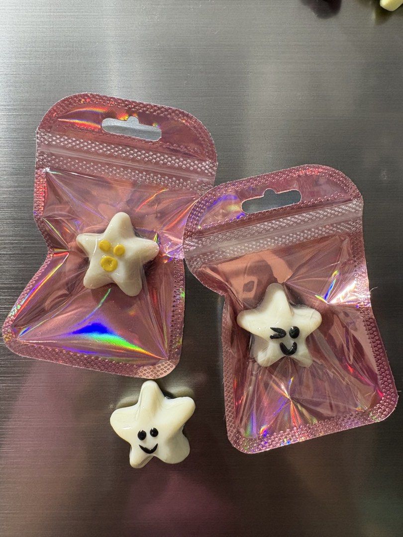 Glow-in-the-dark Star Magnets (Category: Character Goods) located in Paranaque City. Submitted by cosmicwater_46e5b2 (Listing ID 1439742304, Image 3). Description: - Adorable star-shaped magnets - Glow in the dark! - Each star has a unique, smiling face - Available in various colors and expressions - Great for decorating your fridge or any magnetic surface - Small and cute! HANDMADE #giveaway #giveaway #partygiveaways #refmagnet #partyfavor.