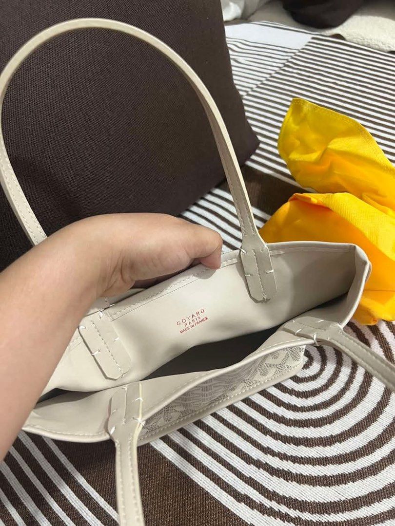 Goyard white original (Category: Luxury Bags & Wallets) located in Davao. Submitted by cleorodin68014 (Listing ID 1439613703, Image 2). Description: - Authentic Goyard St. Louis tote bag - Signature Goyardine canvas - Cream exterior and interior - Leather handles - Includes detachable pouch - Interior stamp: "GOYARD PARIS MADE IN FRANCE".