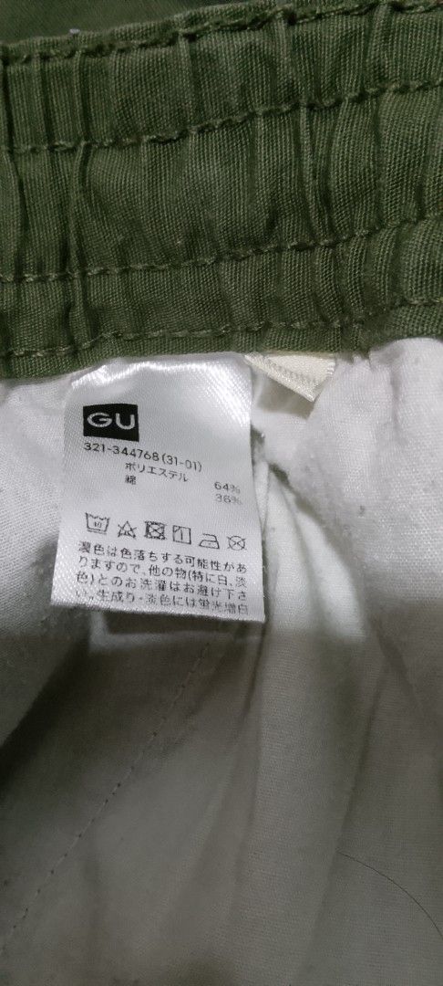 GU Cargo Pants (Category: Jeans) located in Bago City. Submitted by champsthrift (Listing ID 1439737628, Image 3). Description: - Olive green cargo pants - Brand: GU - Features: - Multiple pockets - Elastic waistband - Material: Cotton-polyester blend - Condition: excellent - Size: Not indicated.