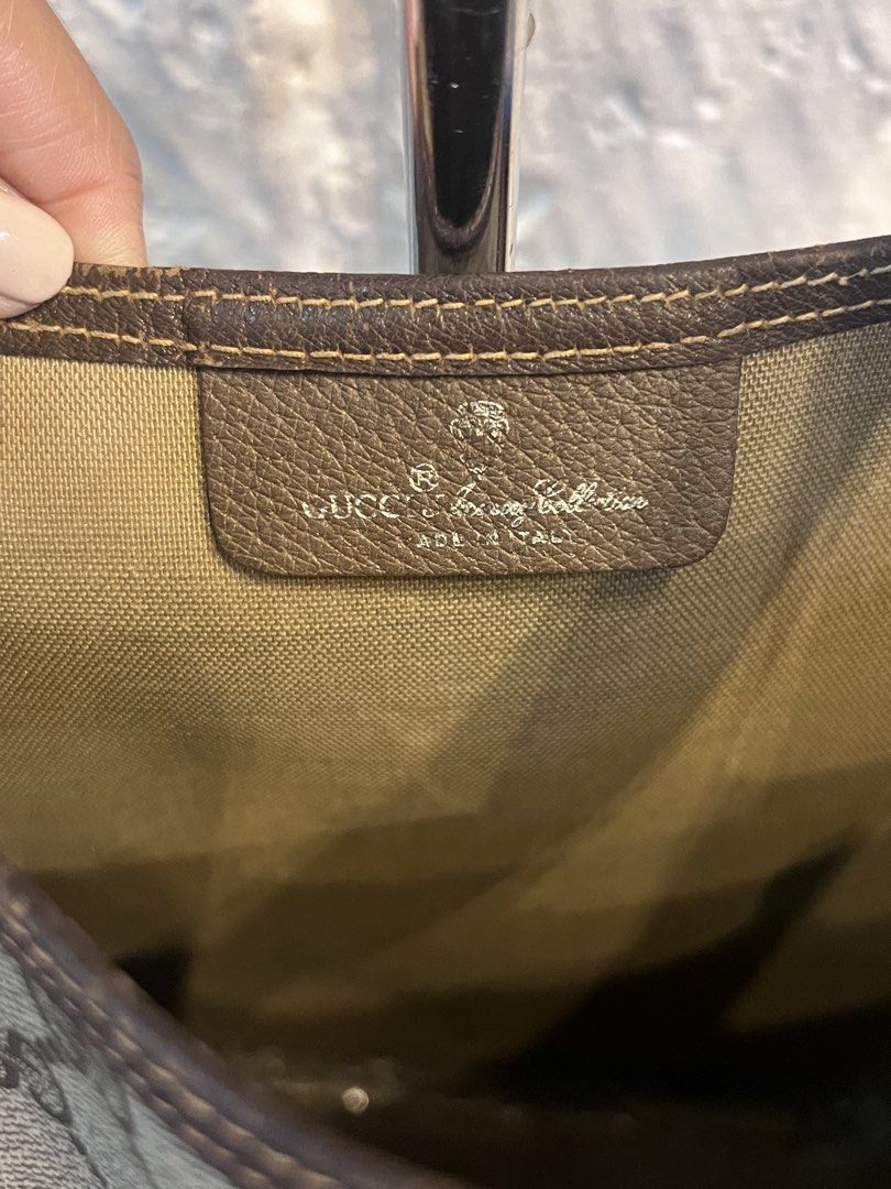 Gucci GG Supreme Tote Bag (Category: Luxury Bags & Wallets) located in Manila. Submitted by lperu71 (Listing ID 1439709328, Image 3). Description: - Authentic Gucci tote bag - Iconic GG Supreme canvas - Front pocket - Green and red stripe straps - Interior leather tag with Gucci logo and "Made in Italy" - Serial number: 40.02.003 - Stylish and functional for everyday use Php 22,500.