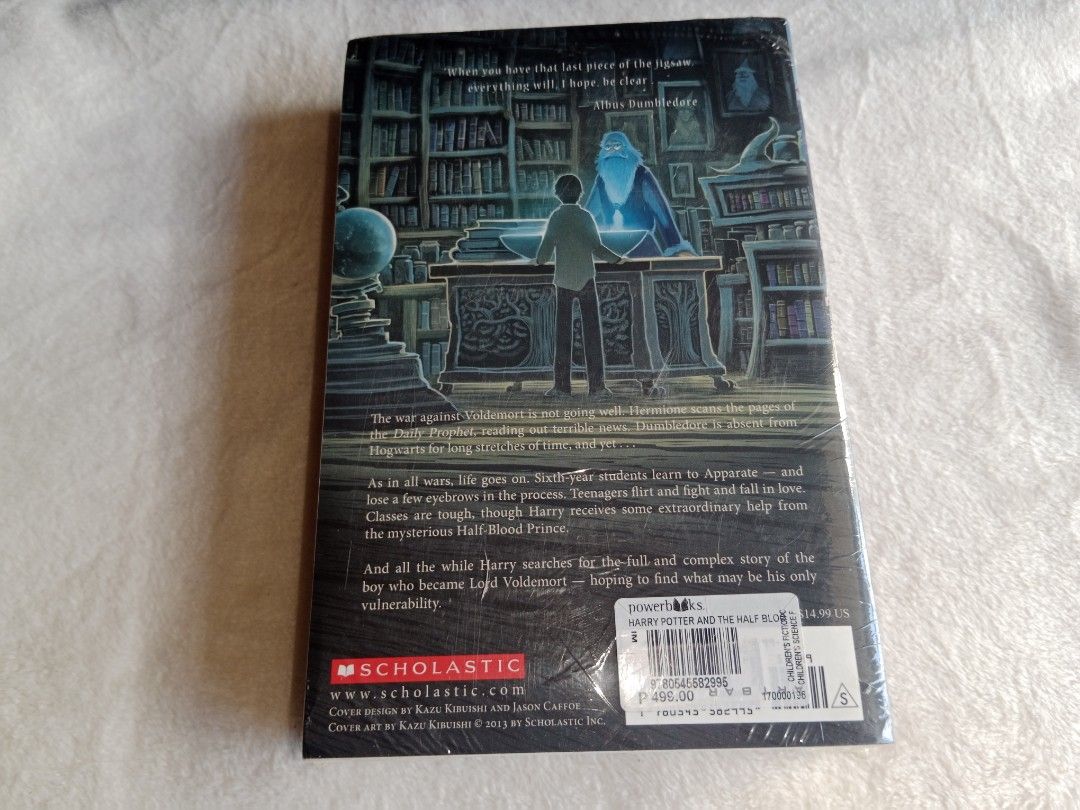 Harry Potter and the Half-Blood Prince (Category: Storybooks) located in Manila. Submitted by angeloarce64172 (Listing ID 1439615921, Image 3). Description: - Harry Potter and the Half-Blood Prince by J.K. Rowling - Published by Scholastic - Brand new, still in original packaging - Cover: Harry Potter and another figure on a cliff - Back: Harry Potter in a library - Spine: White.