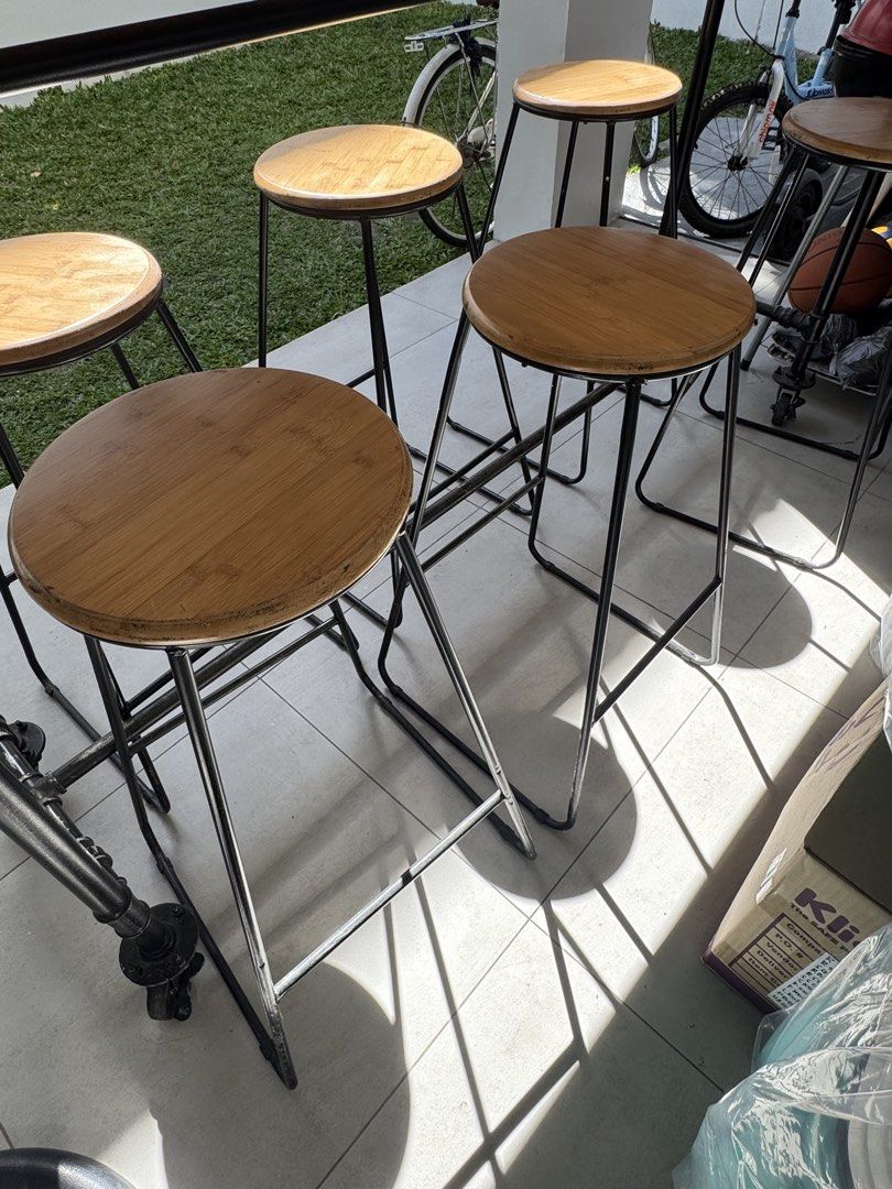 High table and chairs (Category: Tables & Sets) located in Paranaque City. Submitted by BOSS_G (Listing ID 1439611359, Image 2). Description: For sale! 1 High table solid wood and metal 10 High chairs solid wood and metal 8-10 comfortable seating Table is with wheels, easy to relocate Industrial style, Cozy Style Good for indoor and outdoor Heavy duty Please message before calling 09178210548 .