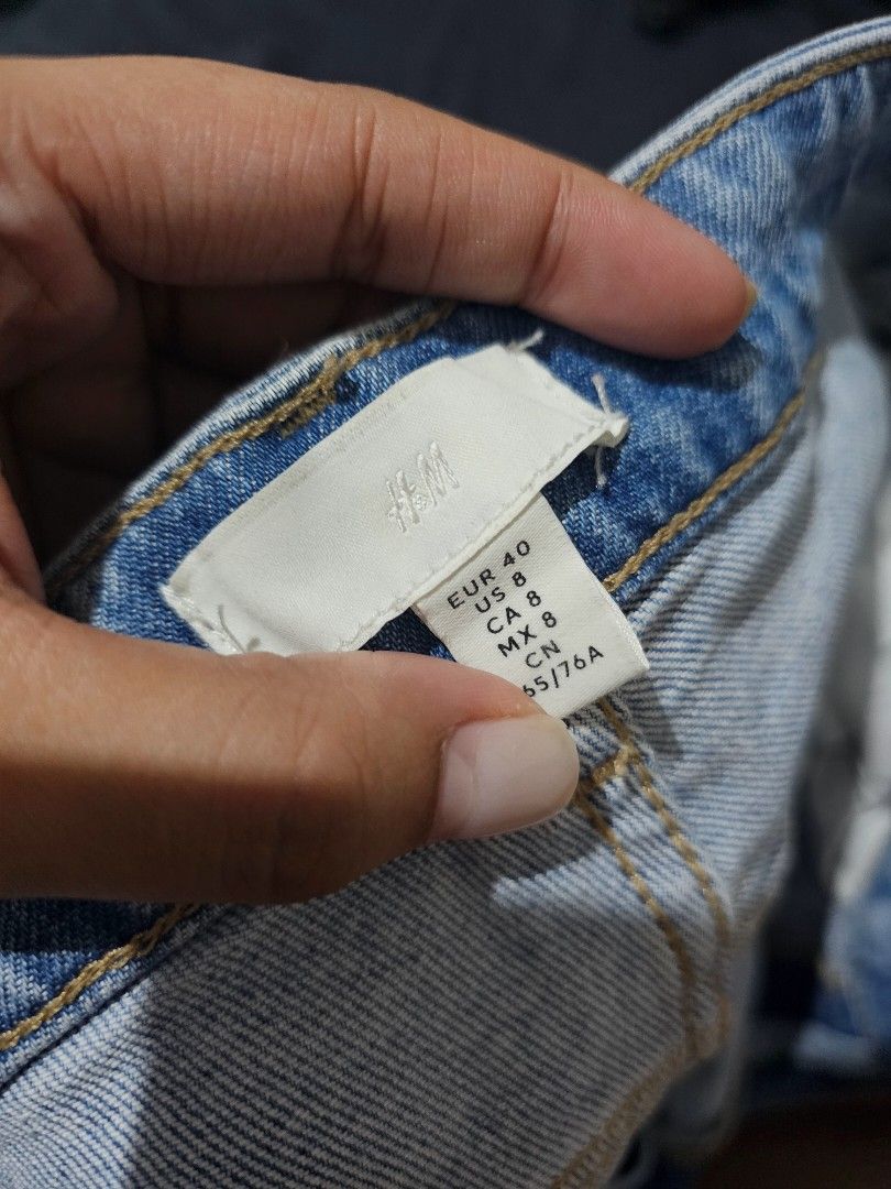 H&M Acid Wash Mom Jeans (Category: Jeans) located in Makati City. Submitted by kalinea (Listing ID 1439755237, Image 2). Description: - H&M light wash denim jeans - Size: EUR 40 / US 8 / CN 165/76A - Unique acid wash pattern - Button and zipper closure - Used twice - No issue.