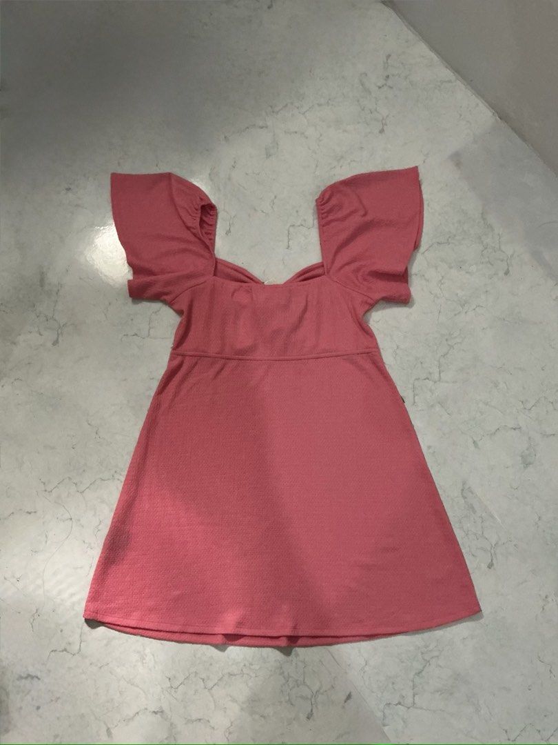 H&M Pink Dress with Flutter Sleeves (Category: Dresses) located in Legazpi City. Submitted by clutterbusterph (Listing ID 1439693235, Image 2). Description: length: 35 inches - Pink mini dress - Flutter sleeves - Drawstring bust detail - Textured fabric - Flared skirt - Ideal for casual or summer wear.