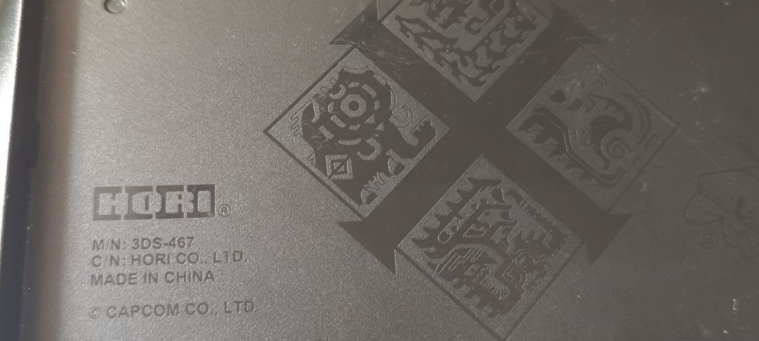 HORI 3DS-457 Monster Hunter 4G Grip (Category: Nintendo) located in Tacloban City. Submitted by angel0al3ta (Listing ID 1439698375, Image 2). Description: - HORI grip for New Nintendo 3DS - Features a Monster Hunter 4G design - Color: Black - Includes buttons on top - Model number: 3DS-457 - Made in China.