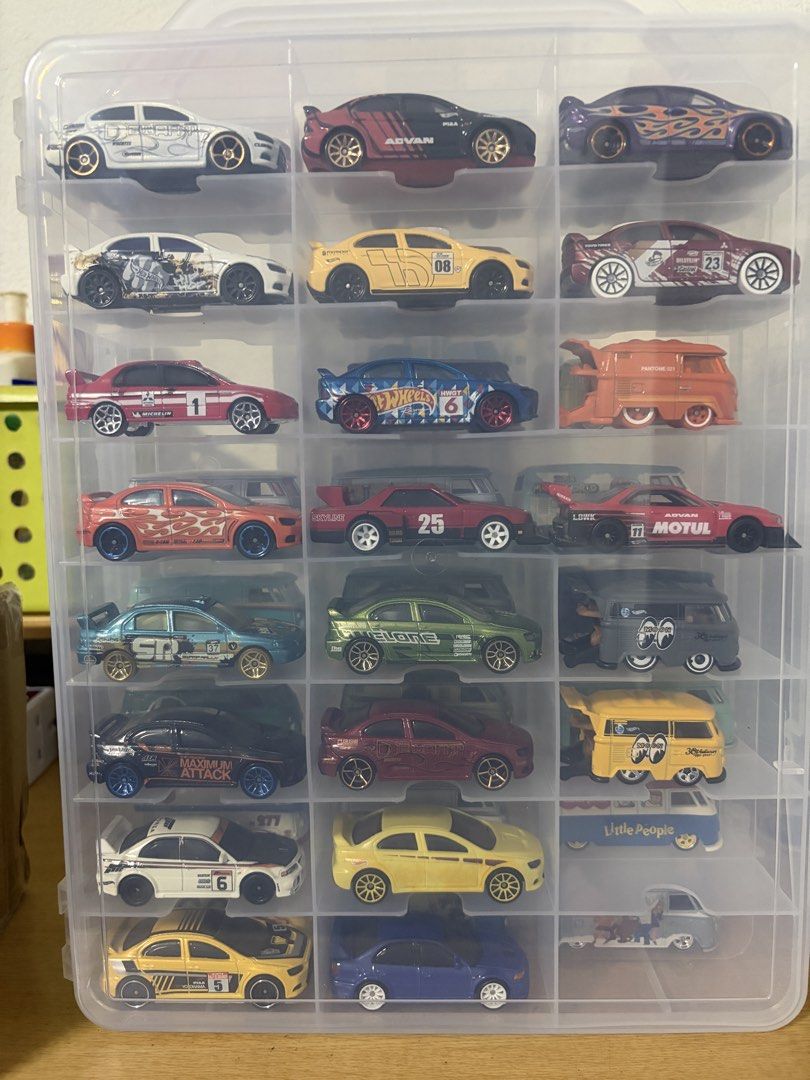 Hot Wheels Mitsubitshi Lancer Evo Lot (Category: Toys & Games) located in Singapore. Submitted by happycollector11 (Listing ID 1439748162, Image 1). Description: Selling entire lot of evos only. Self collect at my place in Tampines. Can nego for serious buyers..