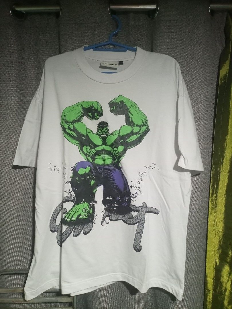 Hulk Graphic Tee (Category: Tshirts & Polo Shirts ) located in Quezon City. Submitted by jelooows (Listing ID 1439778220, Image 1). Description: - White t-shirt - Features a large graphic of the Hulk flexing - Standard crew neck - Offset clothing.