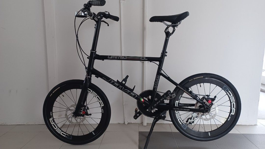 Java minivelo crusier (Category: Bicycles) located in Singapore. Submitted by _dude (Listing ID 1439700998, Image 1). Description: Configured as 8 speed minivelo cruiser. Frame is well used and have sign of scratches and blemishes but otherwise in good condition. Drivetrain consist of 54T chainring and 8 speed 11-32T cassette with Revoshift shifter. Cassette and chain are new. Brakeset are Zoom hybrid brakes and mechanical levers with built in be