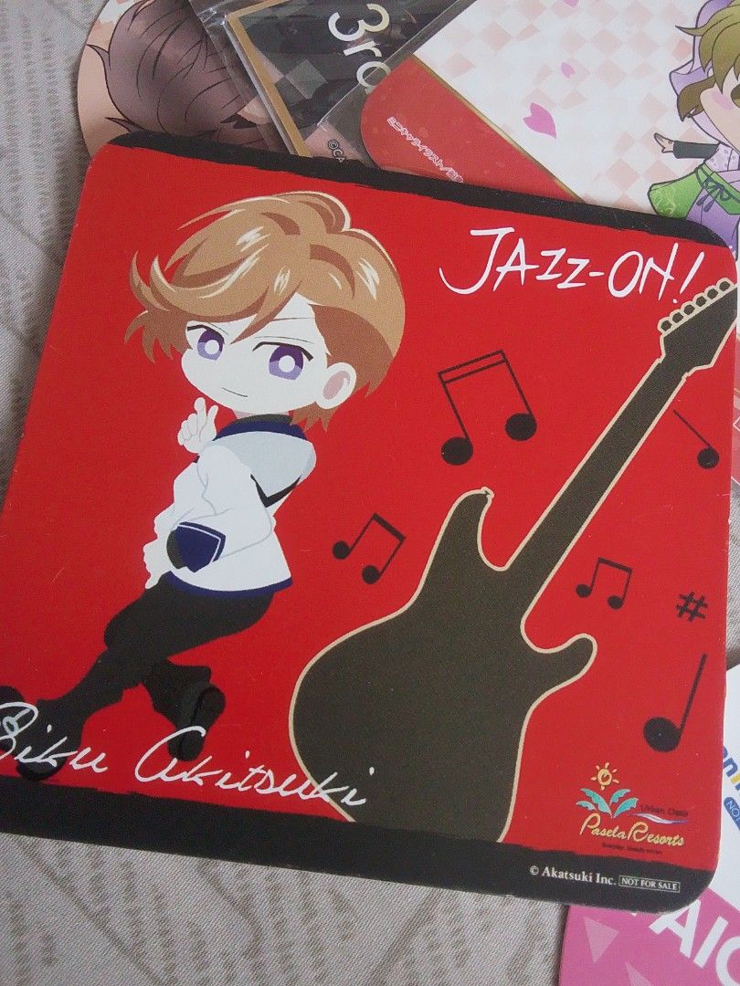 JAZZ-ON! Biku Akitsuki Board Coaster (Category: Musical Instruments) located in Santa Rosa. Submitted by animemerchcollection (Listing ID 1439658612, Image 1). Description: - JAZZ-ON! Biku Akitsuki mousepad. - Features a guitar design. - Red background with musical notes. - From Panda Records. - A must-have collectible for JAZZ-ON! fans..