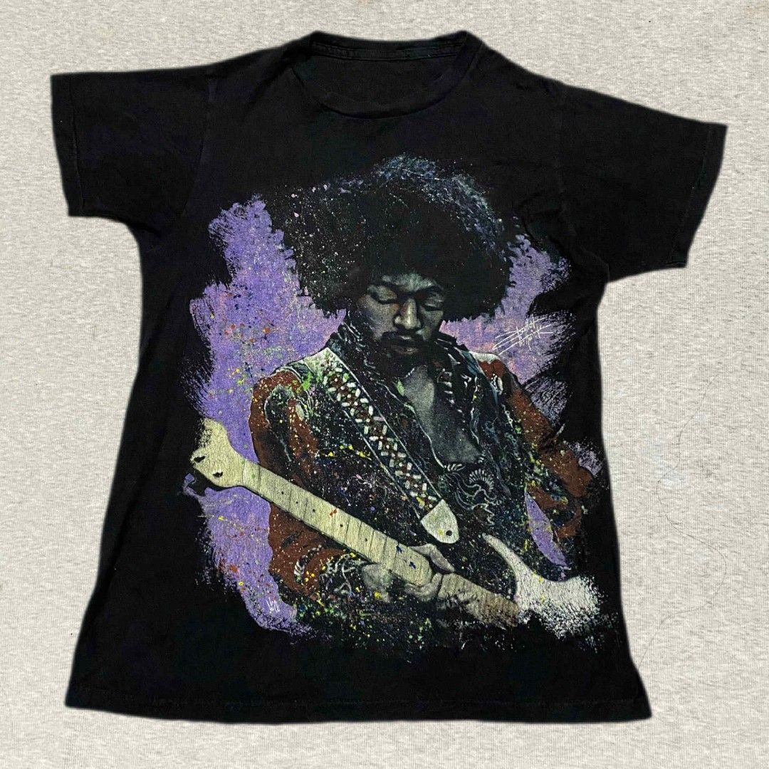 Jimi Hendrix Big Print Band Shirt (Category: Shirts) located in Mabalacat. Submitted by stylists.market (Listing ID 1439653354, Image 1). Description: Length: 25 Width : 18 Condition: 9/10 SUPER LAKING DESIGN SA PERSONAL SUPER NICE & KINIS! VERY COMFY & SMOOTH ON SKIN NATURAL HAIRLINE ONLY SA IILANG PART PO 🥰 NEED WASH NO MAJOR STAIN FRESH FROM BALE.