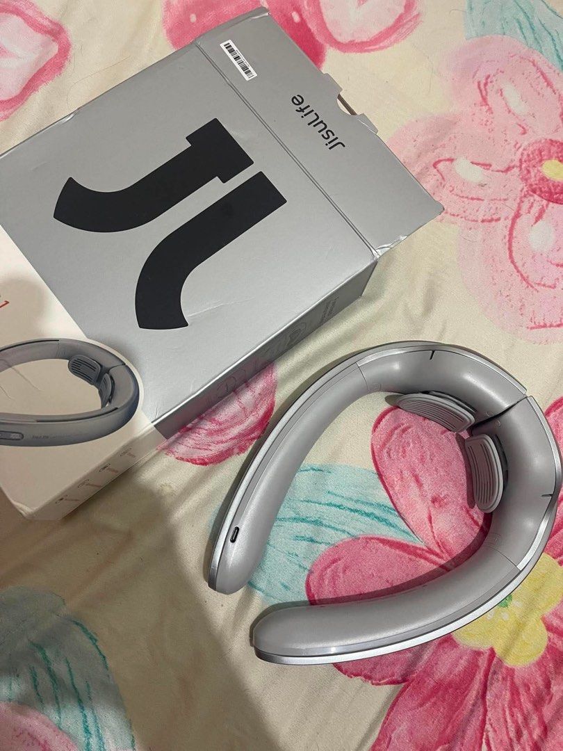 Jisulife Neck Fan Pro (Category: Fans) located in Caloocan City. Submitted by cliffordquisay (Listing ID 1439702640, Image 2). Description: - Jisulife Neck Fan Pro - Portable neck fan for ultimate comfort - Stylish gray color - Includes original box - Features a sleek design - Easy-to-use control panel - Adjustable settings for a personalized cooling experience.