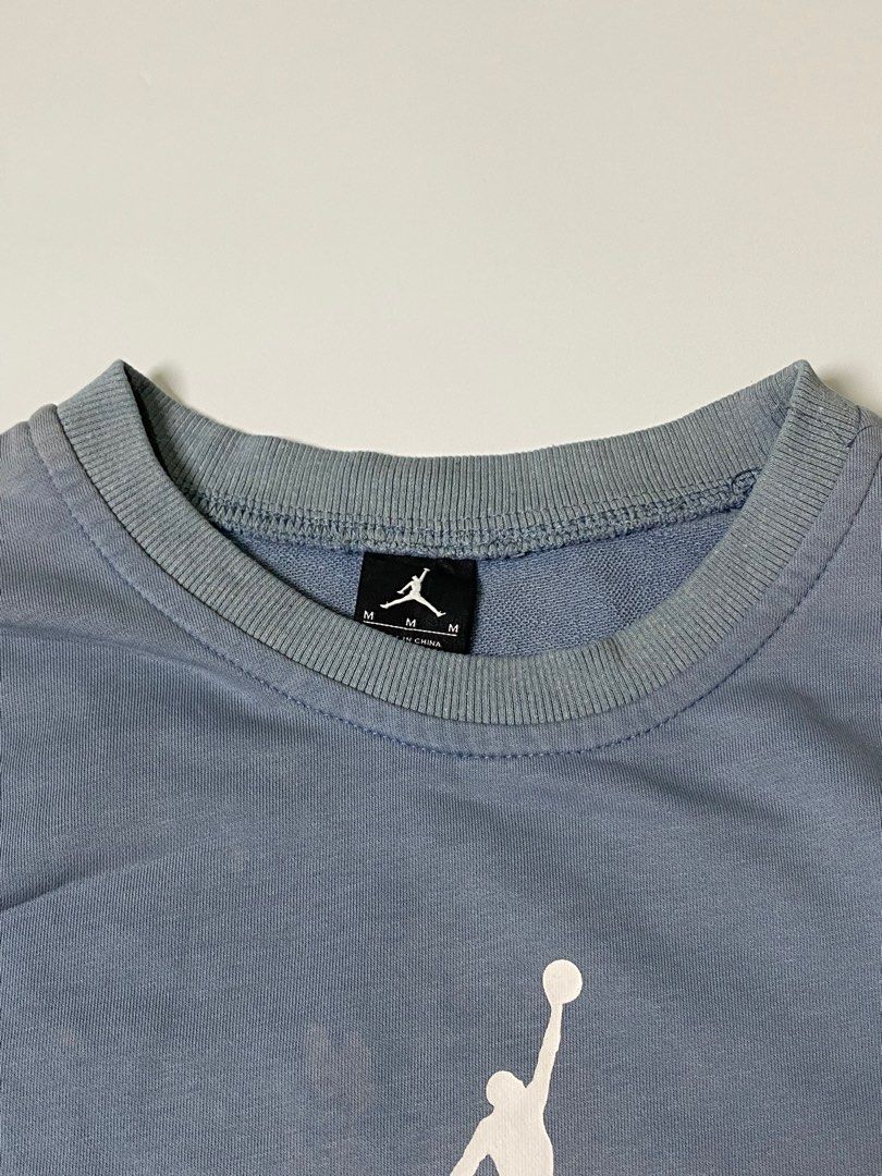 Jordan - blue sweater jump man logo (Category: Coats, Jackets and Outerwear) located in Manila. Submitted by finofindthisart (Listing ID 1439790258, Image 3). Description: Length 24 Width 22 Distressed Measured it by inches This is a pre-loved/thrifted items and may show minor signs of issue due to its vintage nature. Kindly manage expectations. No refunds or exchanges will be accepted. 📍Pasay City DM for inquiries..