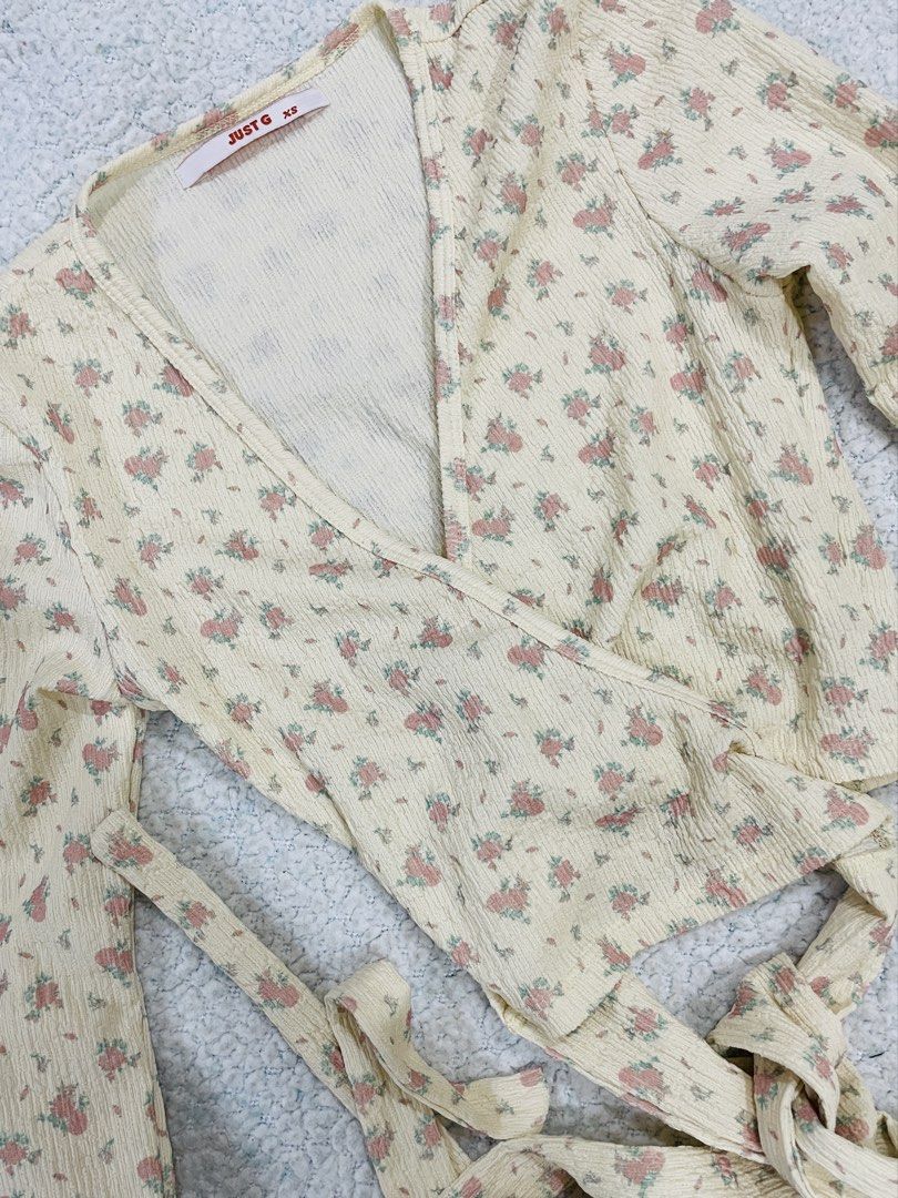 Just G Yellow Floral Wrap Top (Category: Longsleeves) located in Manila. Submitted by bueko09 (Listing ID 1439714251, Image 1). Description: Just G XS Wrap Around Top 🍓 yellow floral/strawberry-inspired design used once only, still like new no stains/flaws super cute for casual/brunch fits ✨.