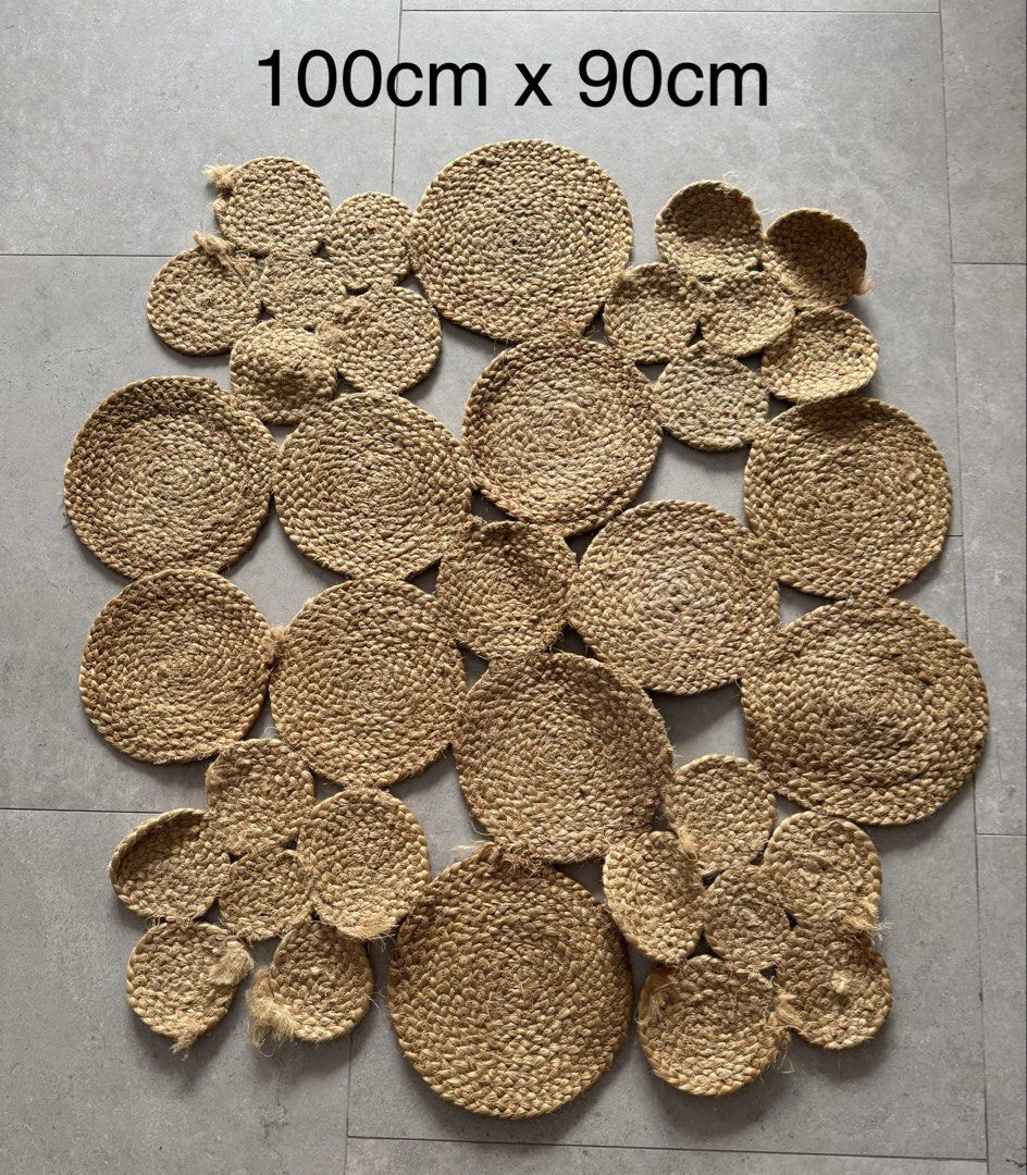 Jute Rug - 100cm x 90cm / 90cm x 90cm (Category: Carpets & Mats) located in Singapore. Submitted by emmatcha (Listing ID 1439609948, Image 2). Description: Beautiful jute rug, perfect for adding a natural touch to your space. Available in two sizes: 100cm x 90cm and 90cm x 90cm. The rug features a unique design with circular and petal-shaped elements. Great condition, ready to enhance your home decor!.