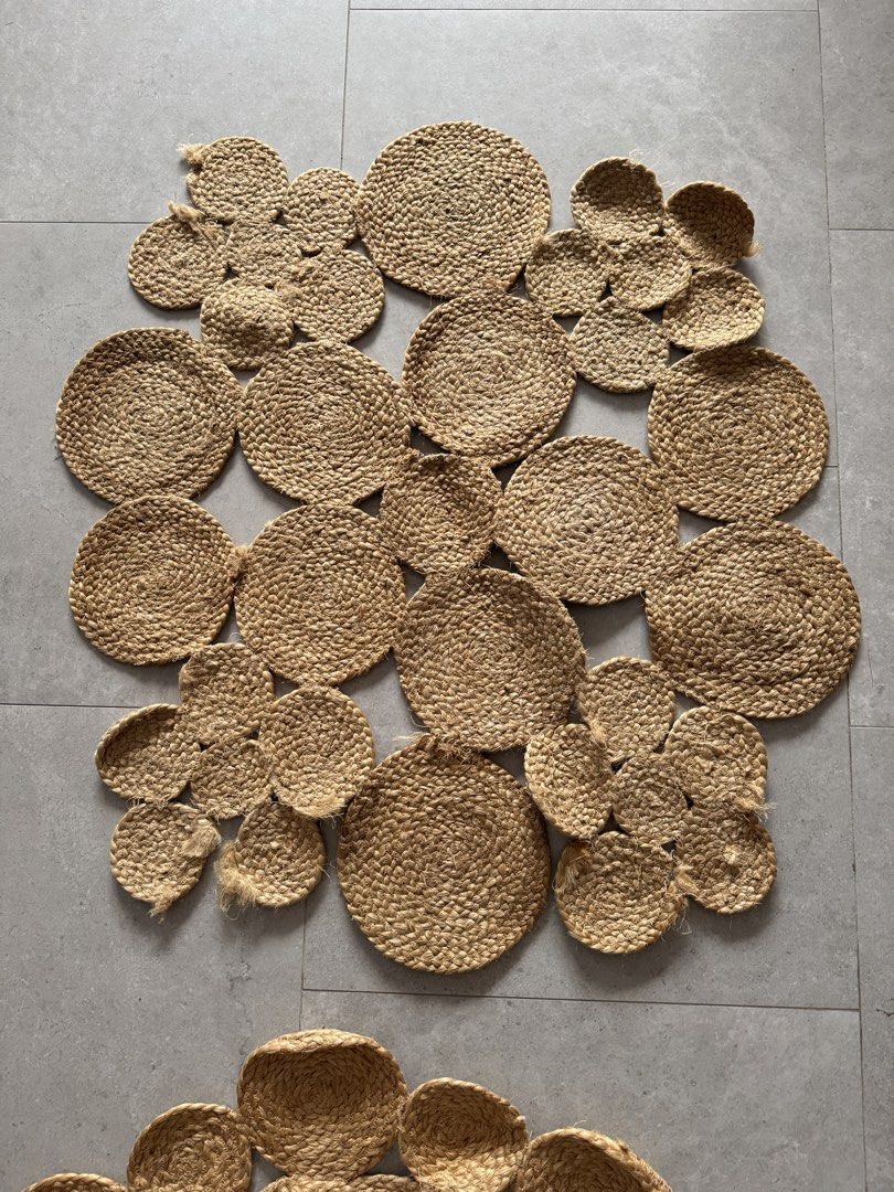 Jute Rug - 100cm x 90cm / 90cm x 90cm (Category: Carpets & Mats) located in Singapore. Submitted by emmatcha (Listing ID 1439609948, Image 1). Description: Beautiful jute rug, perfect for adding a natural touch to your space. Available in two sizes: 100cm x 90cm and 90cm x 90cm. The rug features a unique design with circular and petal-shaped elements. Great condition, ready to enhance your home decor!.
