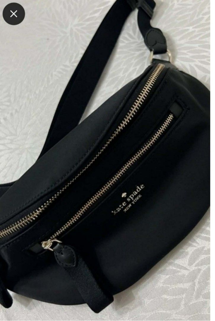 Kate Spade Black Belt Bag (Category: Cross-body Bags) located in Cebu City. Submitted by helentlim (Listing ID 1439623473, Image 1). Description: - Kate Spade belt bag - Color: Black - Main zippered compartment - Front zippered pocket - Adjustable strap - Kate Spade logo - Perfect for carrying essentials.
