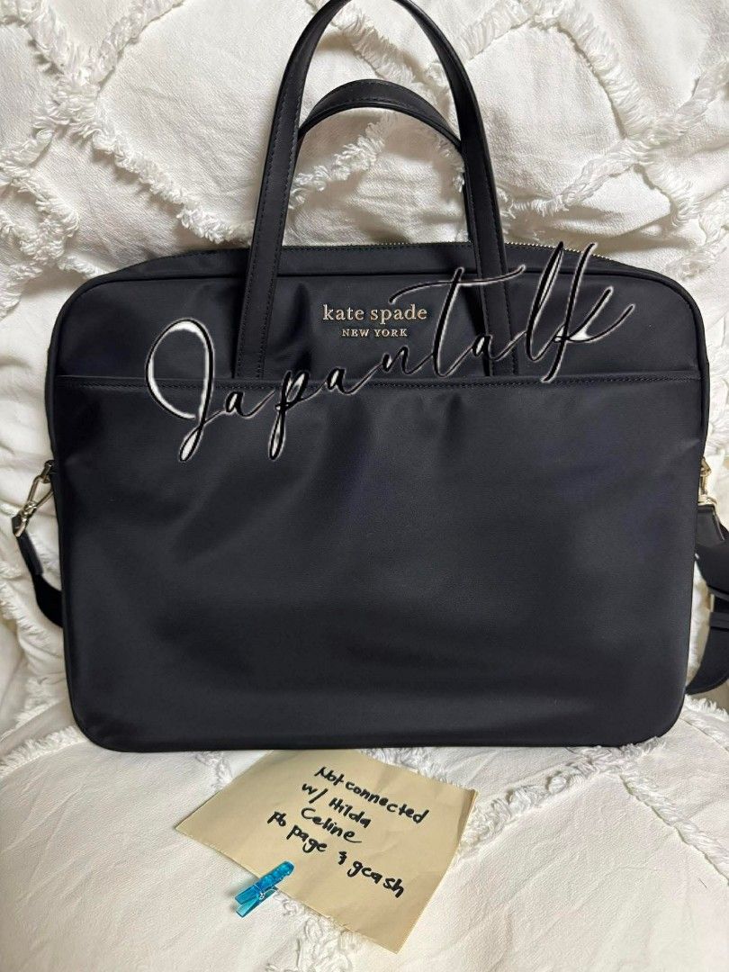 Kate Spade Black Laptop Bag (Category: Laptop Bags & Sleeves) located in Bulacan. Submitted by vintage_purge (Listing ID 1439639912, Image 2). Description: - Black Kate Spade laptop bag - Top handle and detachable shoulder strap - Exterior pocket - Features the Kate Spade New York logo - Made of a nylon-like material - Designed for laptops and essentials.