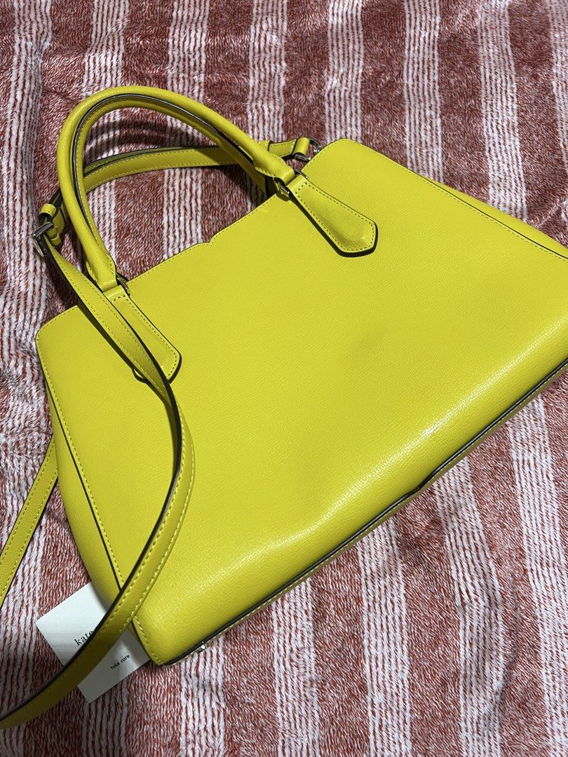 Kate spade medium cross bag (Category: Luxury Bags & Wallets) located in Manila. Submitted by mar.quin (Listing ID 1439670703, Image 3). Description: Unused Personal bag With serial tags Authentic!! Color: yellow Medium size .