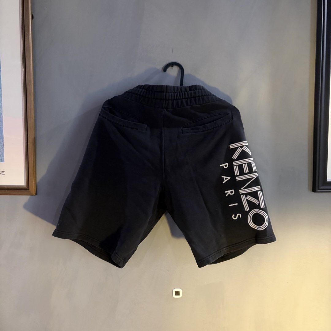 Kenzo - Side Black Logo Shorts (Size XS) (Category: Shorts) located in Las Pinas. Submitted by aldiebuybye (Listing ID 1439700550, Image 3). Description: Purchased way back in 2020 (pandemic era). Runs quite regular to the waistline. Definitely used heavily and already shows visible signs such as faded washes on the clothing material and cracks on the KENZO logo. RFS: Outgrown this already. And I’m on a bigger size now. CONDITIONS ——————— Prices 