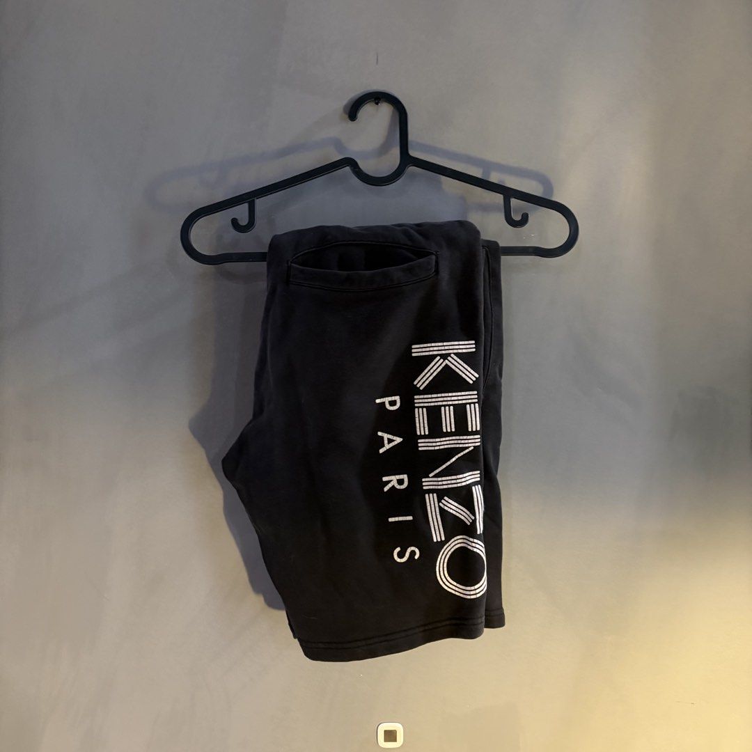 Kenzo - Side Black Logo Shorts (Size XS) (Category: Shorts) located in Las Pinas. Submitted by aldiebuybye (Listing ID 1439700550, Image 1). Description: Purchased way back in 2020 (pandemic era). Runs quite regular to the waistline. Definitely used heavily and already shows visible signs such as faded washes on the clothing material and cracks on the KENZO logo. RFS: Outgrown this already. And I’m on a bigger size now. CONDITIONS ——————— Prices 