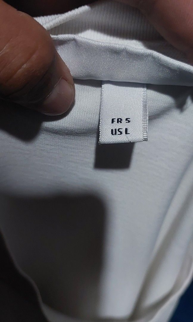 Lacoste white tee (Category: Tshirts & Polo Shirts ) located in Cagayan de Oro. Submitted by johnzj002 (Listing ID 1439637634, Image 2). Description: size L on tag no issue excellent condition.