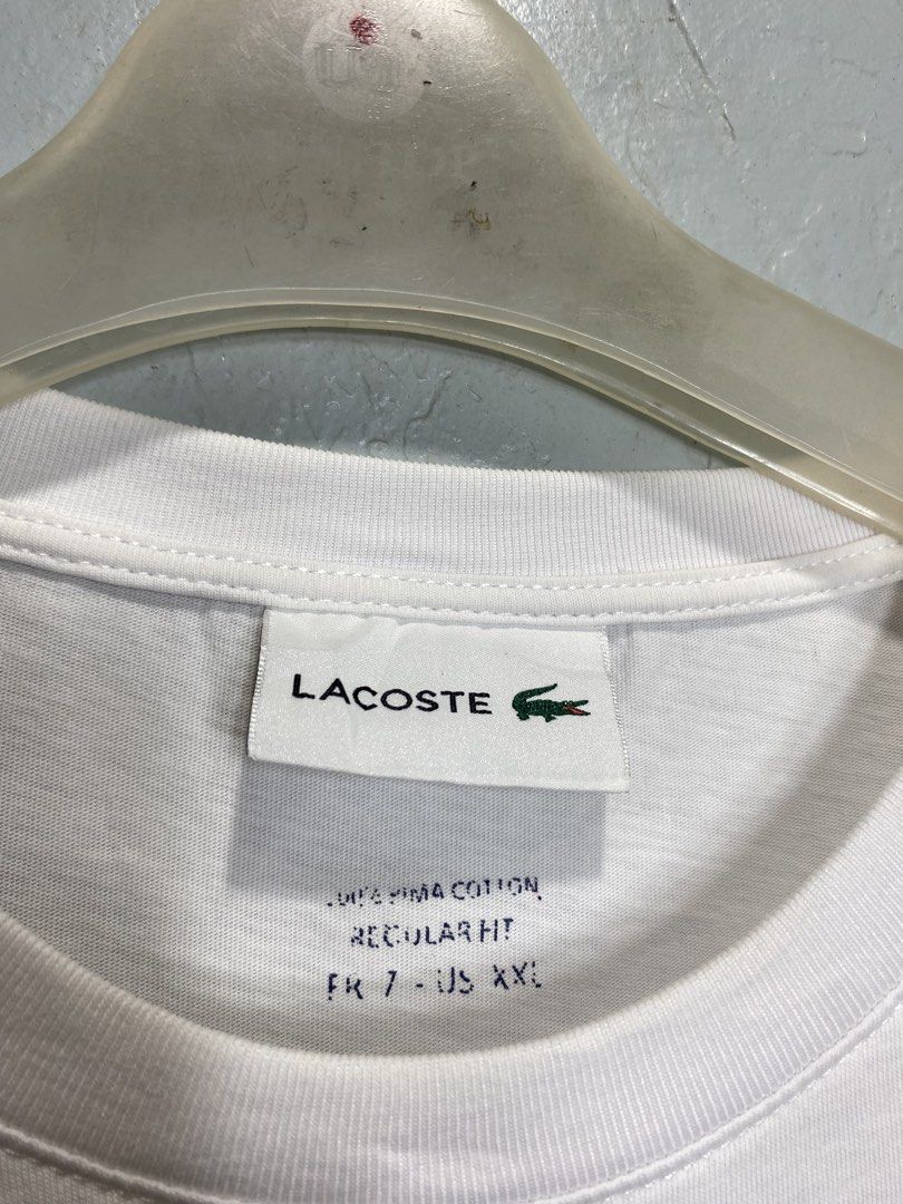Lacoste White T-Shirt (Category: Tshirts & Polo Shirts ) located in Bacong. Submitted by crankneil (Listing ID 1439743419, Image 3). Description: Lacoste 🏷️ + 90 shipping fee -Dimes Width 22 Length 28.5 -Condition 9.5/10 -Color Rate 9.5/10 Excellent Condition Color may vary due to lightning Very Presentable when Worn Pinholes Need Wash Pm/Dm Visayas Dumaguete loc J&T Courier Express 🚛🚛🚛.
