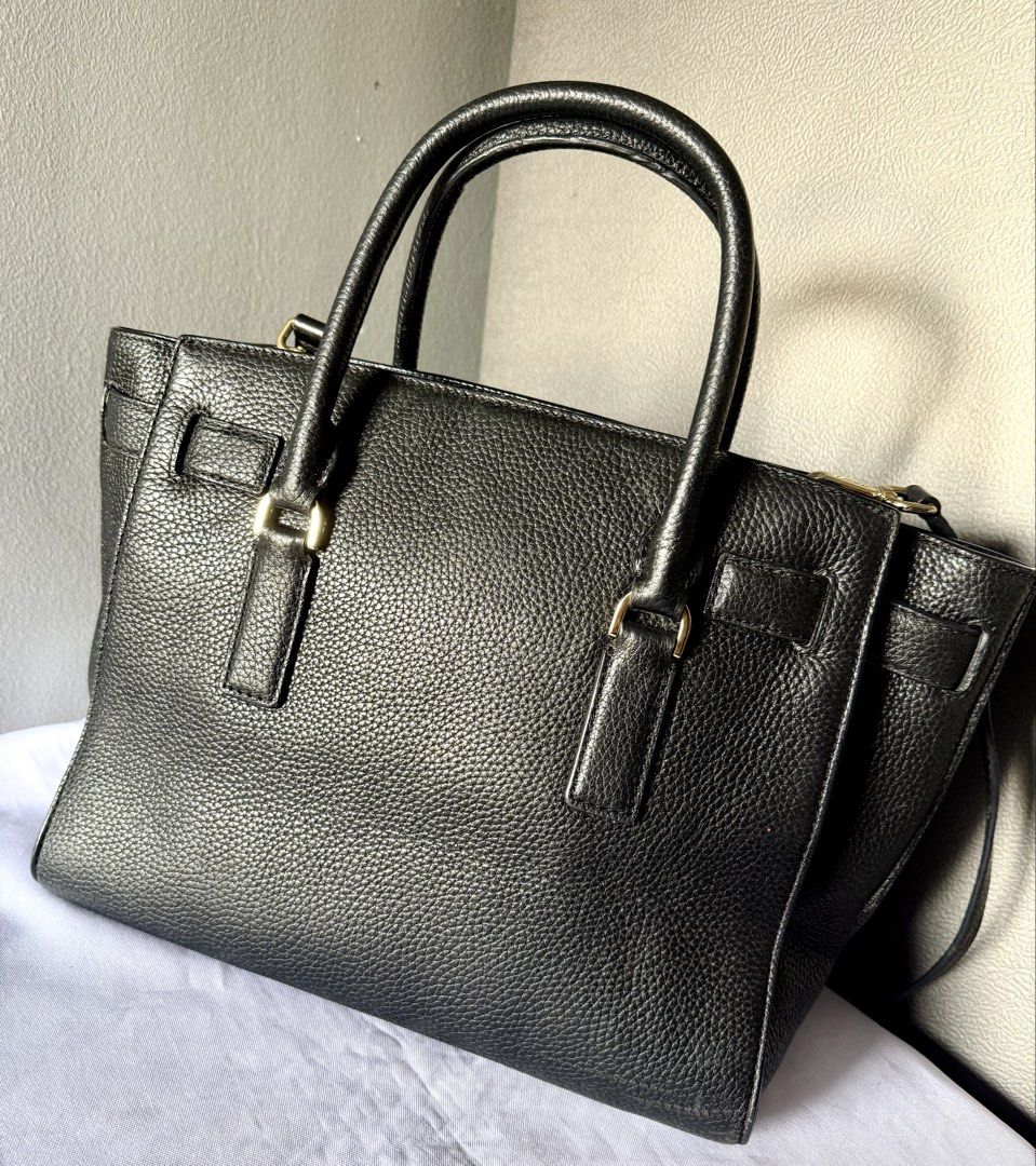 Medium Michael kors Hamilton pebble leather satchel (Category: Luxury Bags & Wallets) located in Davao. Submitted by rebaggedph (Listing ID 1439649717, Image 3). Description: Selling my Michael Kors Hamilton satchel. It’s a classic, versatile piece that fits everything you need for work or a day out! Condition: [9/10 – lightly used] Material: High-quality pebbled leather with gold-tone hardware Features: Iconic MK lock and key, sturdy top handles
